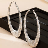 Retro Oval Metal Earrings for Women – Geometric Textured Fashion Jewelry