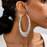 Retro Oval Metal Earrings for Women – Geometric Textured Fashion Jewelry