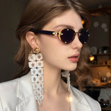 2025 New Oval Frameless Sunglasses European and American Retro Punk Sunglasses Stage Performance Fashion Street Beat Glasses