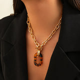 Gold Leopard Print Pendant Necklace – Trendy Geometric Chain Jewelry for Women