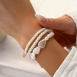 Triple-Layer Heart Pearl Bracelet – French Retro Imitation Pearl Jewelry for Women